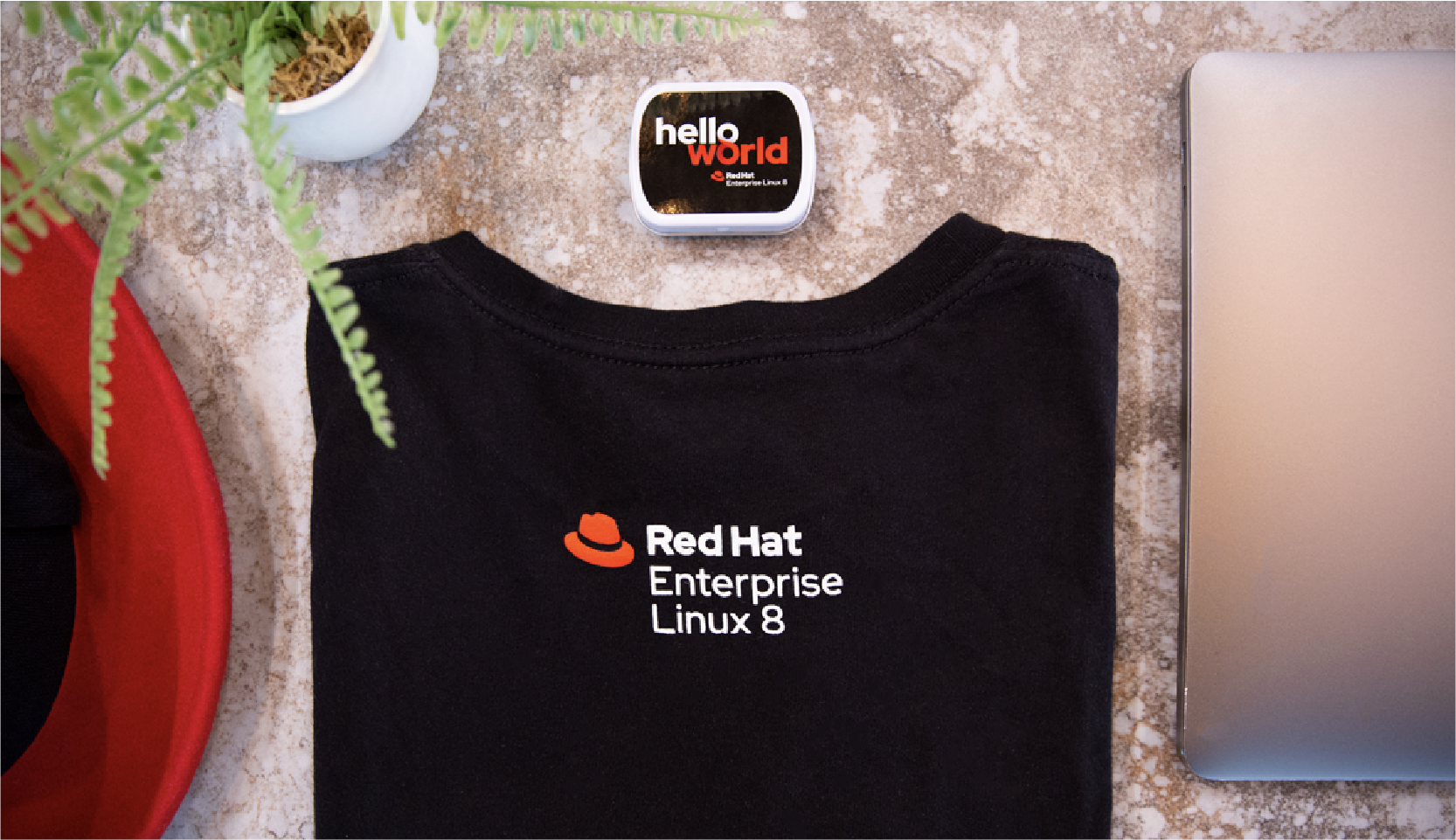 Red Hat Enterprise Linux 8 product logo on the back of a t-shirt