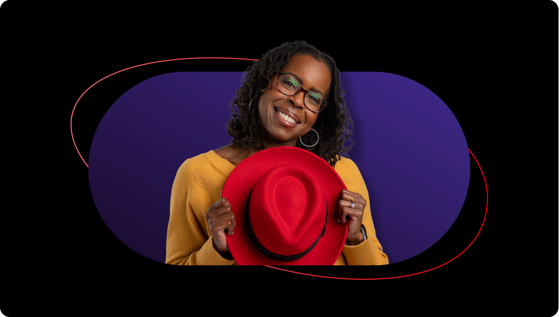 Image showing a Red Hatter holding their fedora.