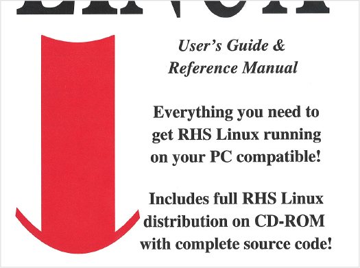 A red top hat on a user manual.