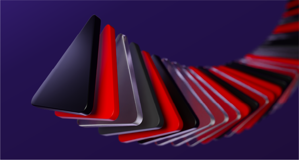 A line of extruded triangles entering the frame from the right, as though they are being duplicated and stacked in order. The triangles are red, black, and transprent glass texture.