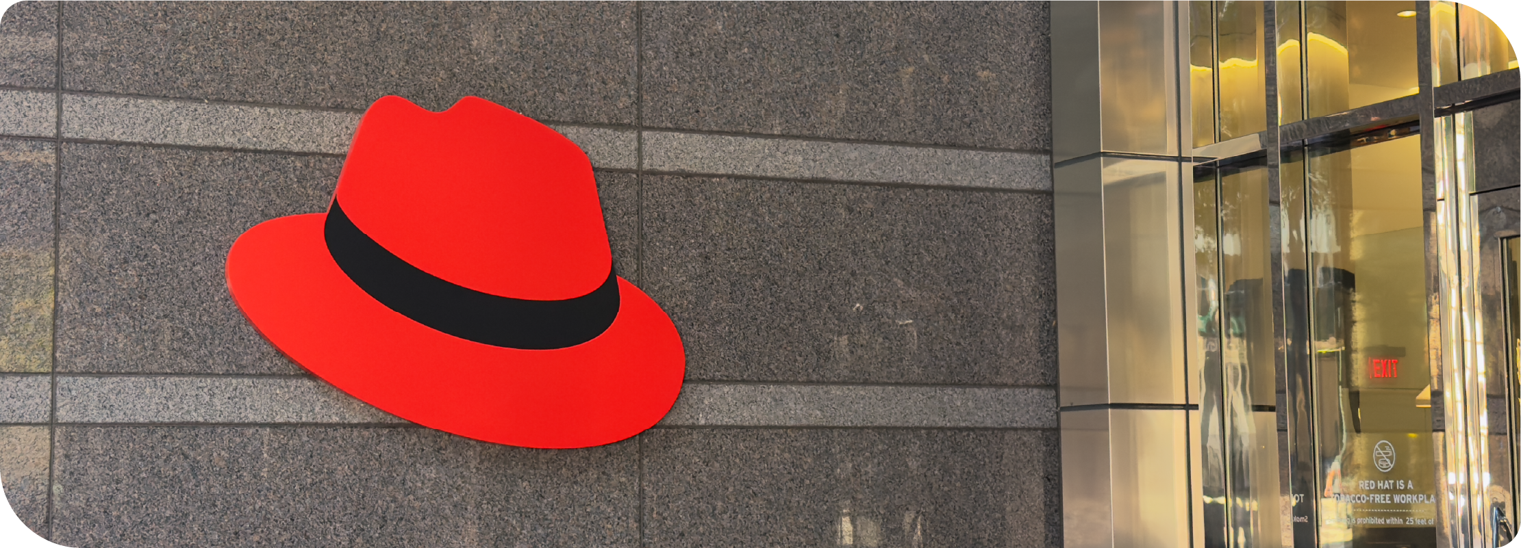 The hat on the wall at the entrance to Red Hat Tower.