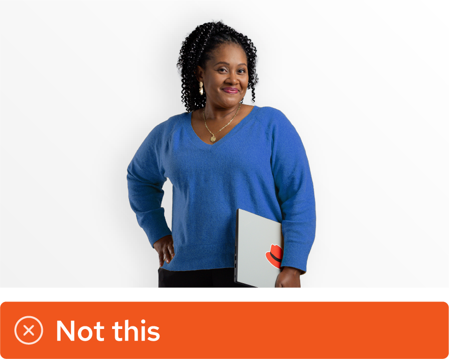 Image showing misuse: A studio portrait has been edited to make the sweater that the person is wearing appear blue, which is not an approved color.