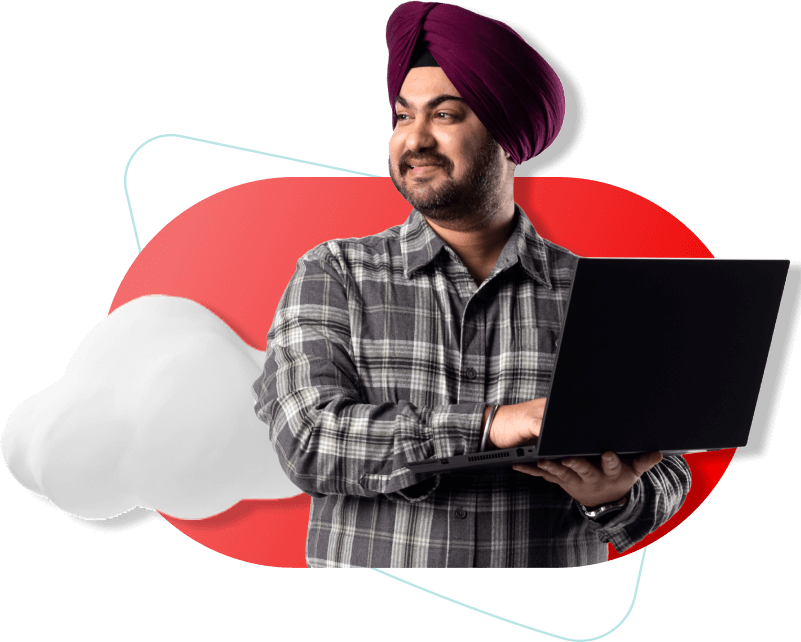 Image of a man holding a laptop