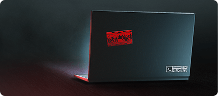 A dark laptop with a sticker and a 