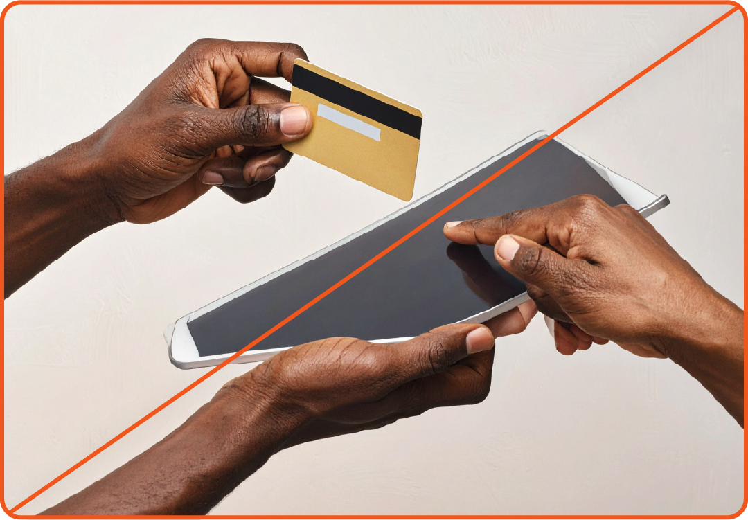 Image showing misuse: AI generated photo showing hands holding a credit card and tablet.